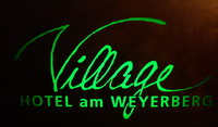 Logo vom Village (Hotel am Weyerberg)